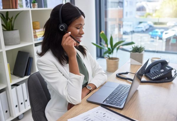 woman working on a laptop doing credit control